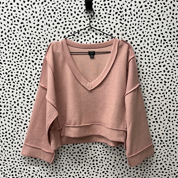 Urban Outfitters Sweaters - BDG Exposed Hem Pink Cropped Sweater